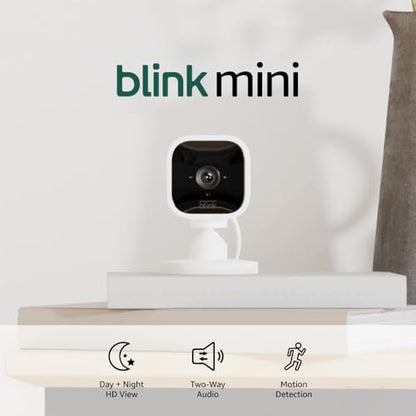 Blink Mini - Compact indoor plug-in smart security camera, 1080p HD video, night vision, motion detection, two-way audio, easy set up, Works with Alexa - 1 camera (White)