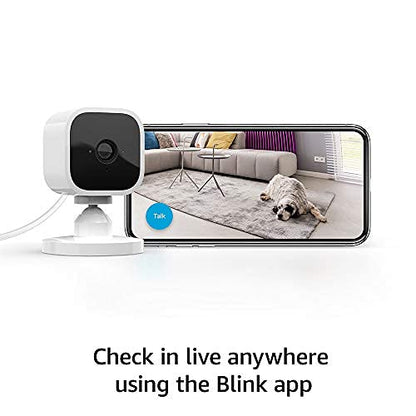 Blink Mini - Compact indoor plug-in smart security camera, 1080p HD video, night vision, motion detection, two-way audio, easy set up, Works with Alexa - 1 camera (White)